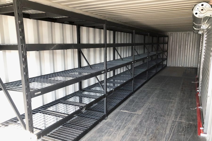 https://www.atscontainers.com/wp-content/uploads/2021/10/Shipping-container-heavy-duty-shelf.jpg