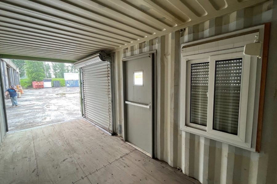 20 foot modified container with door, window and rollup
