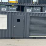 20 foot modified container with door, window and rollup
