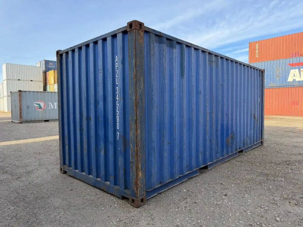 Side view used 20ft shipping container, damaged, on clearance Edmonton