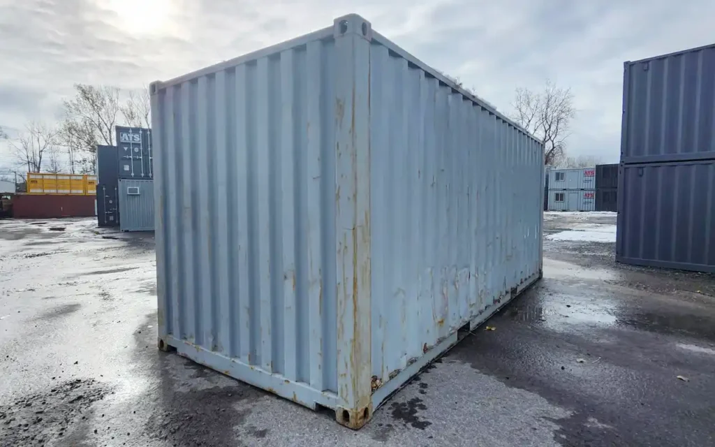 Front corner view of 20ft used container showing light grey paint finish