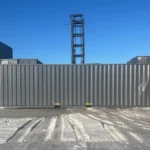 Standard ISO corner castings on a 40ft HC container for safe handling and stacking in industrial yards.