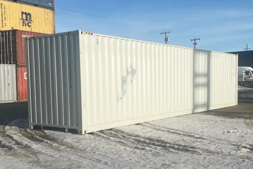 Exterior side profile of a closed 40ft High Cube shipping container featuring corrugated CORTEN steel walls and white paint finish.