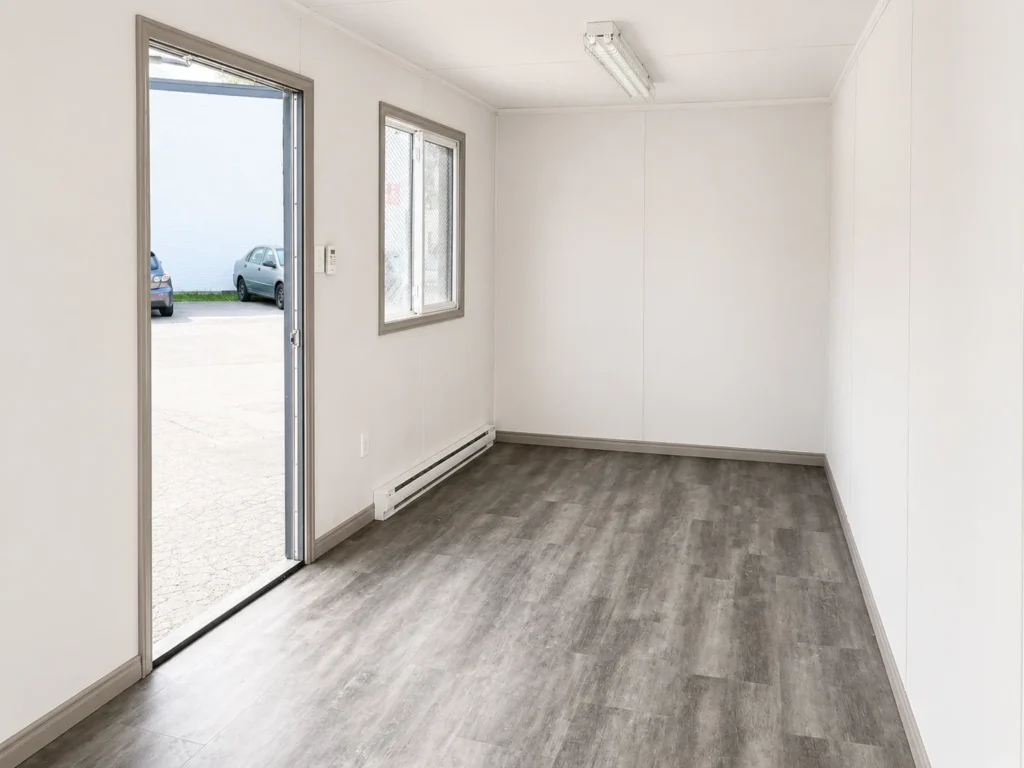 Insulated 20-foot mobile office container with windows and electrical setup