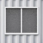 Protective window grill installed on a Job Box container
