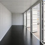 Interior view of a 40 ft high cube side door shipping container with open side doors for easy access
