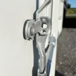 Close up of a Hasp lock on the awning window of the shipping container