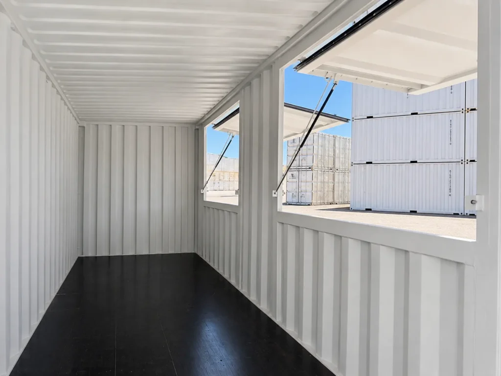 Interior of 20 FT shipping container kiosk with two open serving windows