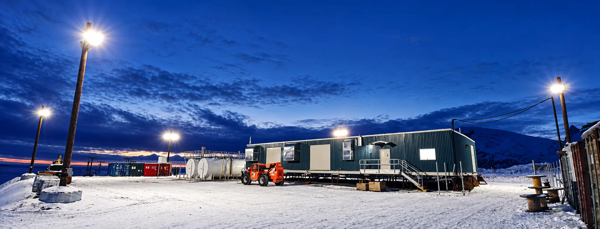 Shipping containers visible in the background of the photo illustrate their resistance to the extreme cold of Canada’s Far North.
